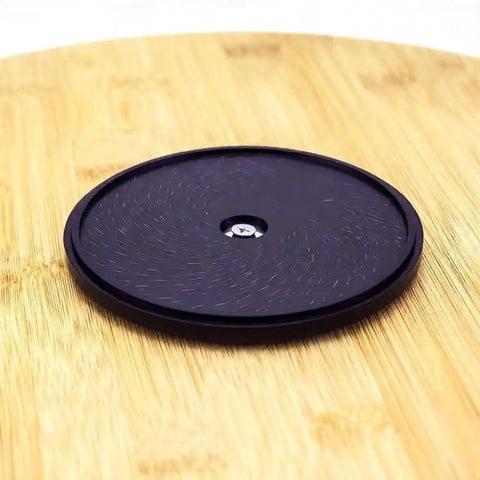 Bottom view of 14 Inch Handmade Bamboo Lazy Susan Organizer With No Fuss 360 Degree Turntable showing spinning mechanism.