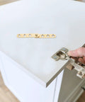 Installing Two Pack Copper Concealed Door Hinges With Noise Reduction And Wide Rotation Angle on white cabinet door