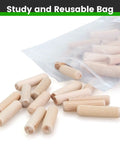 100 Count Solid Wood Dowel Pins Half Inch By Two Inch Kiln Dried Hardwood Fluted Beveled in a reusable bag with pins scattered.