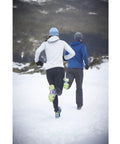 Runners wearing Ice Traction Cleats For Running Shoes, Lightweight Grip With Full Sole Coverage, Cleats On Heel And Forefoot in snow