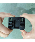 Hands holding Portable Wire Welding Fixture Tool With Adjustable Soldering Clamps And Alignment Guides For Precise Wire Positioning