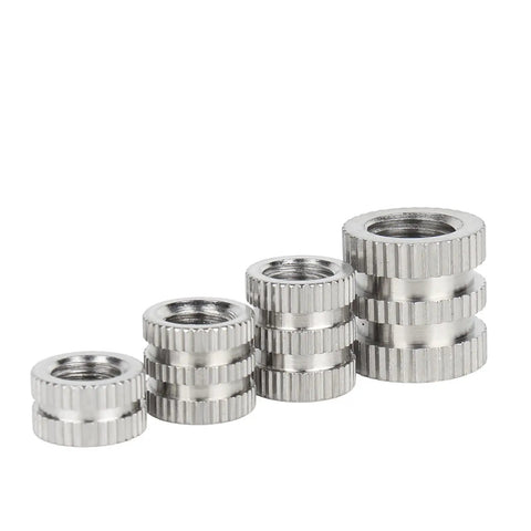 M6 Knurled Stainless Steel Insert Nuts for Injection Molding, showing knurled texture and various sizes in stack view.
