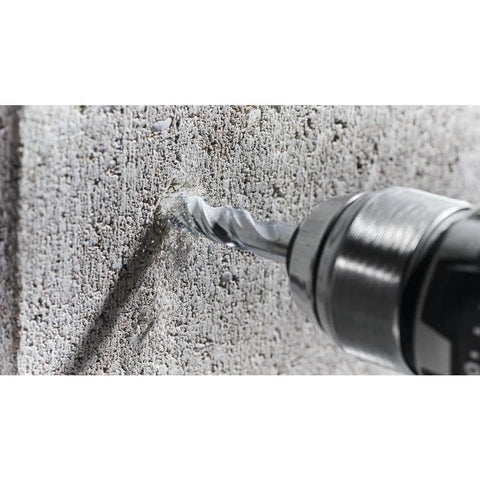 Masonry drill bit, 3/4 in x 4 in x 6 in, steel, fast-spiral, in drill against concrete wall