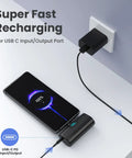 Two Pack Grab And Go Portable Charger With Built In USB C Cable, 5200 Mah Pocket Power Bank charging a smartphone with USB-C.