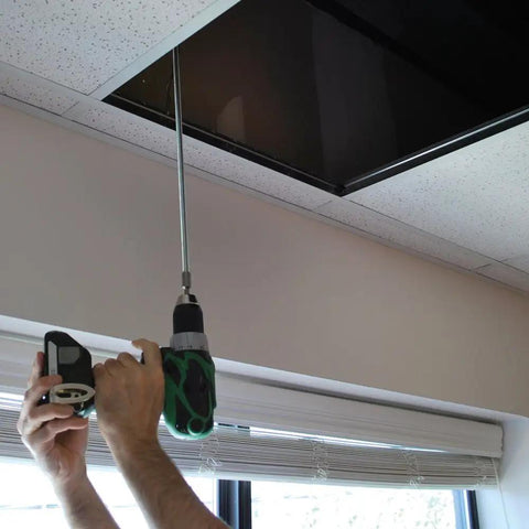 Person using a cordless drill with a Beat Proof Alloy Steel Hanger Bolt Driver With Quick Release Ball Stop for carpentry tasks.