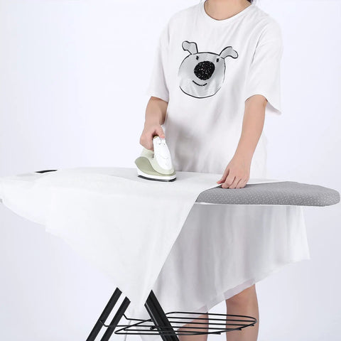 Person using Heavy Duty Ironing Board Cover With Four Layer Thick Padding Two Inch Elastic Stain And Scorch Resistant Finish