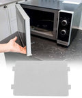 Microwave Mica Sheet Set 10 Pcs High Heat Resistant Insulation for protecting magnetron shown in front of open microwave