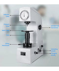 Built Like A Tank Rockwell Hardness Tester Machine featuring gauge, handwheels, and work table for measuring hardness.