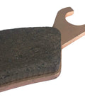 Close-up view of Heavy Duty Front And Rear Brake Pads For Can Am Outlander, showcasing sintered copper material and friction surface.