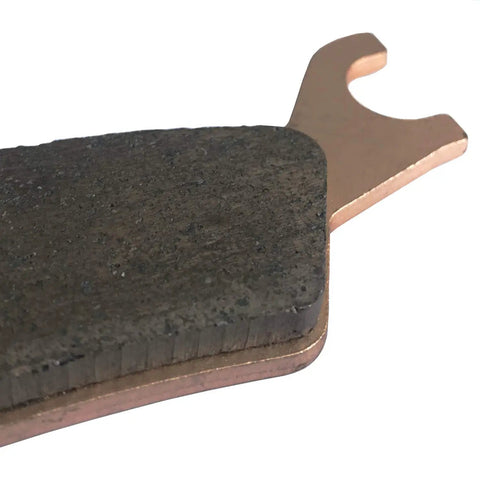 Close-up view of Heavy Duty Front And Rear Brake Pads For Can Am Outlander, showcasing sintered copper material and friction surface.