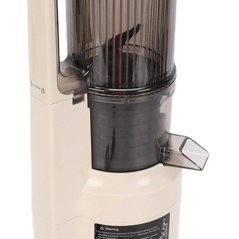 Experience The Ultimate Cold Press Juice With This 550 Ml Slow Masticating Juicer Machine, close-up of black and beige juicer spout.