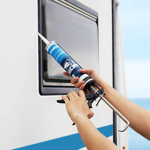Applying RV Roof Sealant Self Leveling White Two Pack Lap Caulk For Roofing on camper window seam.