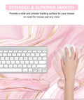 Close-up view of Large Extended Keyboard And Mouse Pad Set With Memory Foam Wrist Rests For Ergonomic Typing Ultra Smooth Desk Pad 3 Piece Pink Gold For Home Office Study And Gaming showcasing a keyboard and hand on mouse
