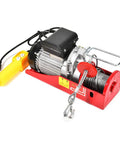 Built Tough 1500 Lb Overhead Electric Hoist Lift Crane For Garage Engine Work, visible motor, pulley, and cable with remote control.