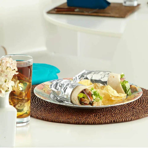 Wrapped sandwiches with Pre Cut Pop Up Aluminum Foil Sheets 14 By 10.25 Inches Pack Of 50 for meal prep on woven mat