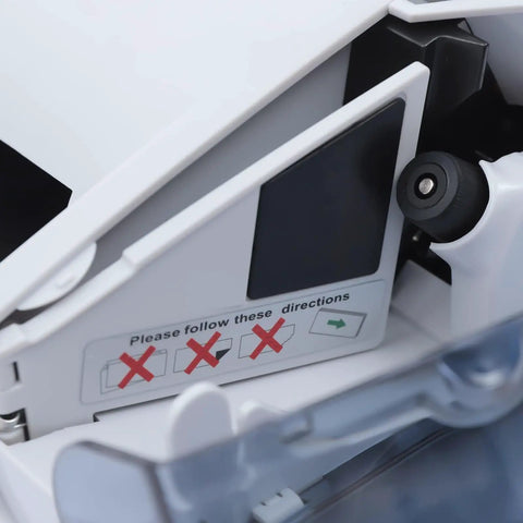Close-up of Mini Portable Money Counter Machine controls and instructions for use, showcasing detailed features and layout.