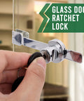 Close-up of Sliding Glass Door Ratchet Lock With Chrome Finish For Cabinets And Display Showcases, equipped with keys in use.