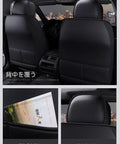 Car interior showing black leather seat covers with back storage pockets, ideal for added functionality and style in vehicles.