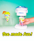 Electric Countertop Snow Cone Maker For Summer Hangouts Hella Awesome Slushie Machine creating fluffy shaved ice cones.