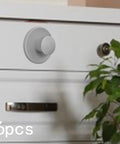 Stick-On Cabinet Pulls 6 Pack, Self-Adhesive Knob on white drawer, Modern Gray PP Material for quick no-drill install