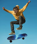 Skateboarder performs trick on board with Electric Blue Lightning Skateboard Grip Tape For Longboards Anti Slip Wear Resistant