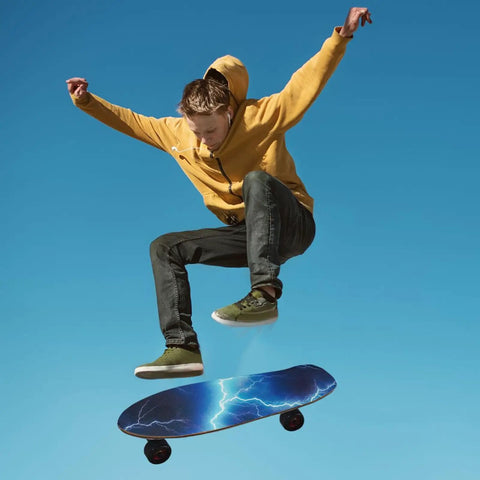 Skateboarder performs trick on board with Electric Blue Lightning Skateboard Grip Tape For Longboards Anti Slip Wear Resistant