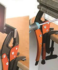 4-Piece Hands-Free Pliers And Grip Holder Set in use for pipe, welding, cutting, and securing various materials on a workbench.