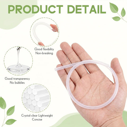 Hand holding a clear glue stick from a 100 Pack Clear Hot Glue Sticks For Most Glue Guns, 1.67 Ft Long, 0.27 Inch Diameter Mini Melts