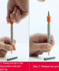Using Dual Head Nail Setter And Door Hinge Pin Remover Tool Set Five Piece Kit to position and release spring punch on surface.