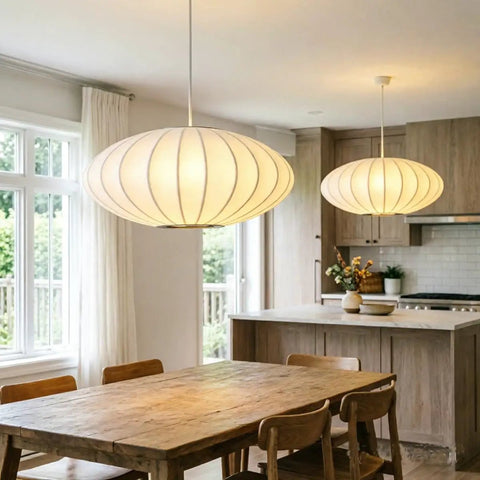 AFSEMOS 20" Japanese Wabi Sabi Pendant Light Silk Hanging Lantern Lamp above a wooden dining table in a bright kitchen.