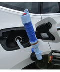 Portable Battery Fuel Transfer Pump For Vehicle Maintenance With Auto Shutoff And Leak Proof Design Perfect For Gas, Oil And Diesel Handling On The Go For DIY Car Owners, blue pump in use.