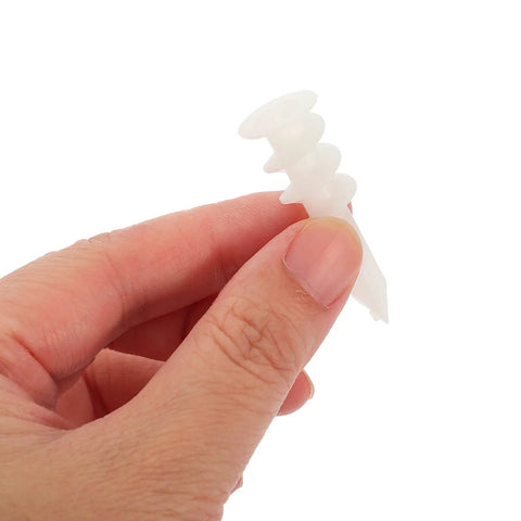 Hand holding a white screw from the 300-Piece Multi-Function Drywall Anchors And Screw Kit With Easy Install, White POM Material