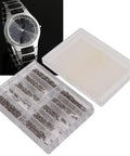 Pro Level Stainless Steel Crosshead Screws For Watch Case Back Repair With Several Precision Sizes Arranged Inside A Secure Labeled Storage Bin Silver Edition, showing assorted screws in a clear organizer.