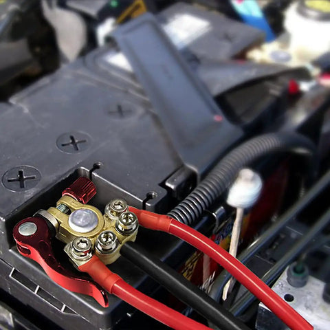 4 Way Quick Release Battery Terminal Connectors Set for SAE JIS Type A Posts, installed in a vehicle with multi cable connections, brass and steel construction