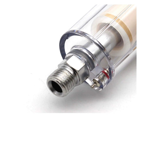 Close-up of Slick Drop In Quarter Inch Airbrush Water And Oil Separator Inline Hose Filter showing threaded connection for compressor.