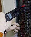 Open Jaw Voltage Continuity And Current Tester Workhorse 600 Volt And 100 Amp With LED Worklight in use on electrical panel