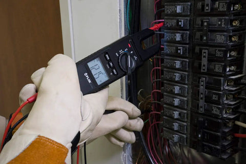 Open Jaw Voltage Continuity And Current Tester Workhorse 600 Volt And 100 Amp With LED Worklight in use on electrical panel