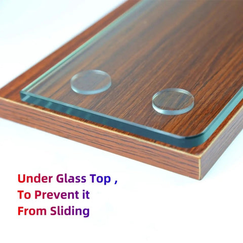 Extra Soft Clear Glass Table Top Bumpers Nonadhesive Antislip Polyurethane Spacers under glass top on wooden surface.