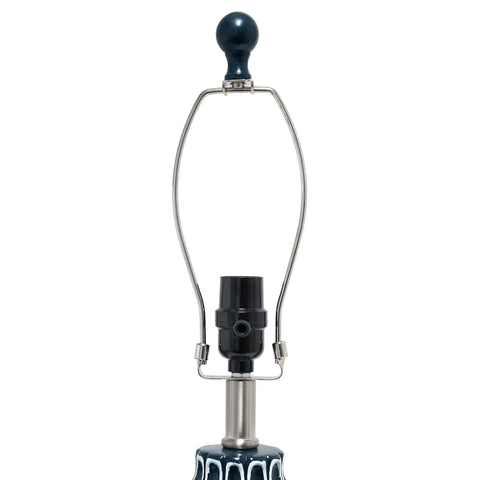 Blue Ceramic Table Lamp With Handpainted White Pattern showing socket, metal harp, and finial without shade, modern home decor lighting.