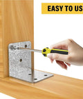 Using a screwdriver to install Forty Piece Heavy Duty Metal Corner Braces And Top Tier L Brackets For Woodworking.