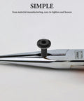 Pliers holding a black socket button head cap screw from the 20 Piece Set Black Socket Button Head Cap Screws With Nuts For Cabinets And Chairs