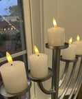 Display of six pack flameless pillar candles with 3D flame, battery-operated real wax LED votive candles, safe home decor