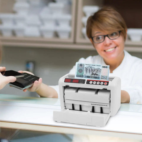 Portable Digital Money Counter With UV And MG Detection, 800 Bills Per Minute in use at a bank counter.