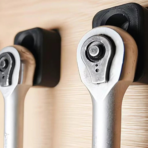 Close-up of 3-Piece Impact Ratchet Wrench Rack System For Home Garage Organization mounted on wall with quick-release socket wrenches.