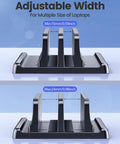 Vertical Laptop Stand For Desk With Dual Slots Space Saving 4 In 1 Design Adjustable Width Laptop Organizer For MacBook Mac HP Dell Microsoft Surface Lenovo Keeps Your Desk Clean And Your Productivity On Point, viewed from front showing adjustable dual slots.