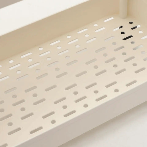 Close-up of smooth beige plastic shelf of Hella Roomy Rolling Storage Organizer Cart with sturdy rubber wheels.
