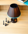 Upgrade Your Home Lighting Game With This 9 Piece E26 Lamp Switch Knob Set Featuring Durable Plastic Rotary Sockets That Make Changing Table Lamps A Total Breeze And Super Easy To Install For Any DIY Fan, black knob parts beside table lamp