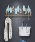 Rock-Solid Wall Mount Coat Hanger Hook Holder with adjustable hooks displaying a scarf and handbag for organized entryway storage.