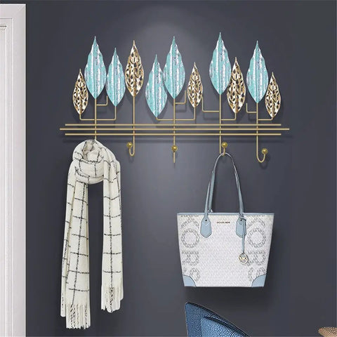 Rock-Solid Wall Mount Coat Hanger Hook Holder with adjustable hooks displaying a scarf and handbag for organized entryway storage.