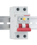 Pro Grade Heavy Duty Two Pole Residual Current Circuit Breaker With Ironclad 30mA Grounding And Overload Tripping Switch For Tough Residential Electrical Panels 230V 16 Amps mounted on a rail.